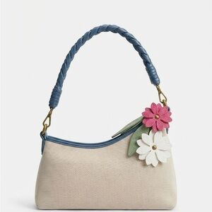 Elegant Canvas Shoulder Bag with Floral Accents